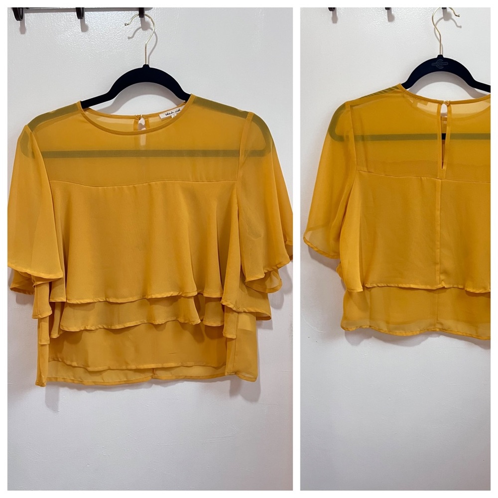 Yellow layered top, size large fits like a medium